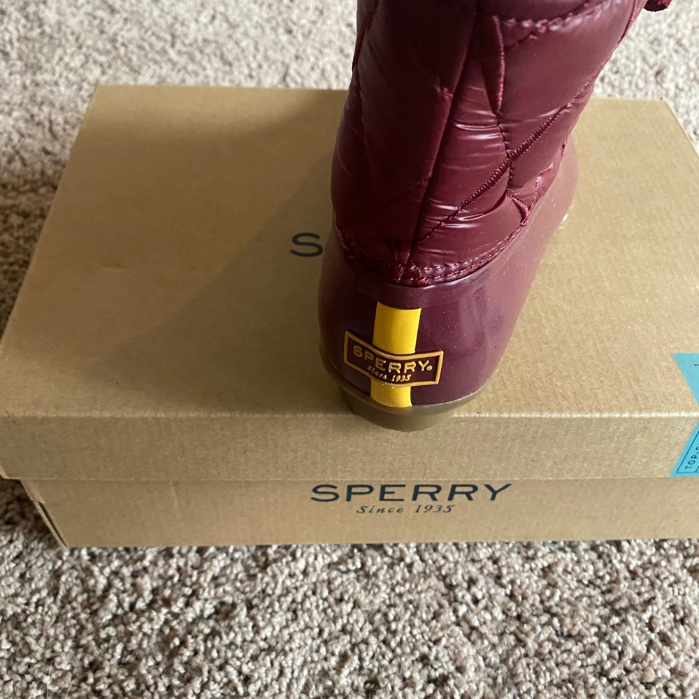 Burgundy Sperry’s brand new.  Too big size 8